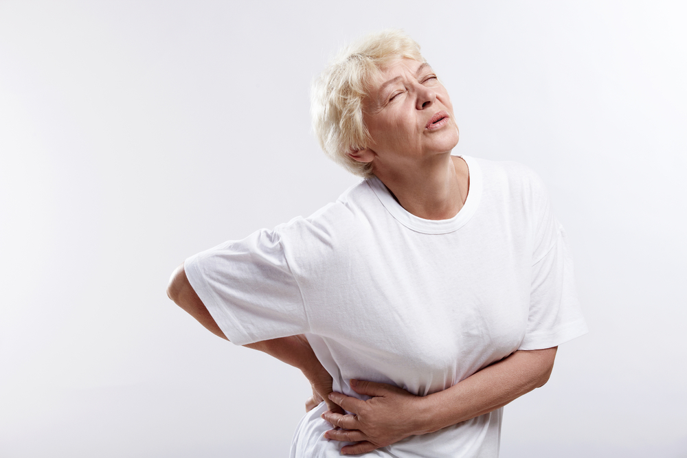 mature woman back pain.jpg
